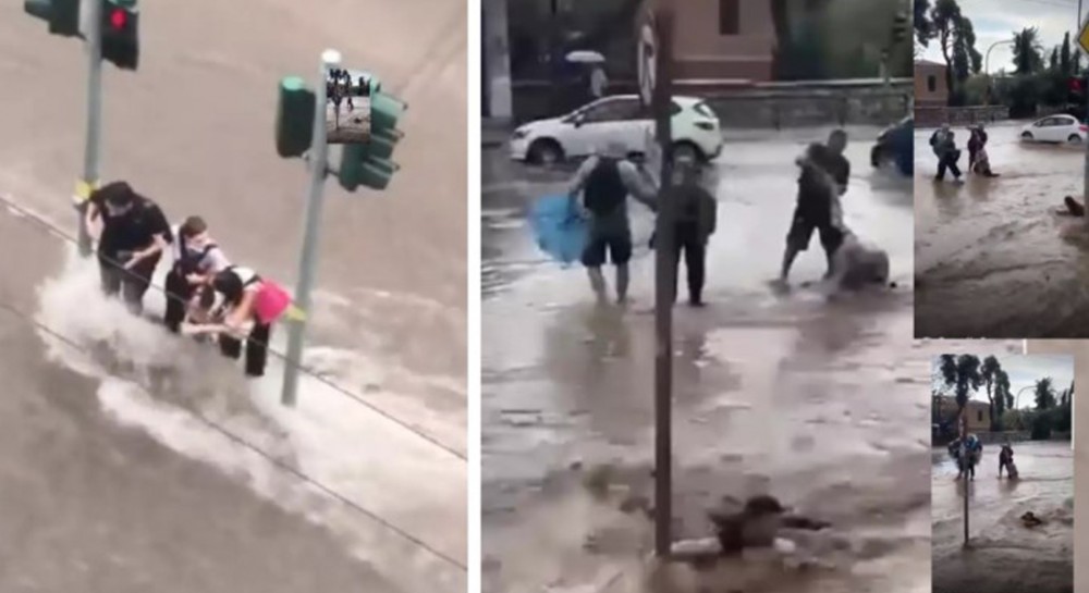 ΑΘΗΝΑ ΚΑΚΟΚΑΙΡΙΑ-ΑΔΙΑΝΟΗΤΟ: Πολίτες πιάνονται από σηματοδότες για να μη τους παρασύρουν οι χείμαρροι (Video)