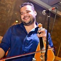 Μουσική βραδιά με λυράρη στο Κόκκινο Σπίτι